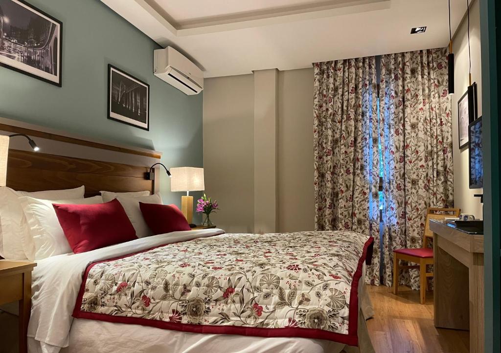 Postel nebo postele na pokoji v ubytování Hotel Boutique Britanico
