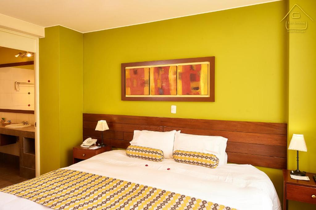 Postel nebo postele na pokoji v ubytování Hotel Los Tambos Boutique