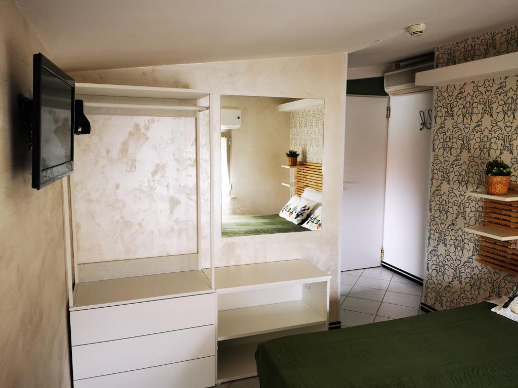 TV a/nebo společenská místnost v ubytování Hotel La Nidiola