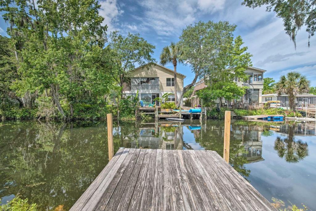 Spring Hill Home on Stilts with Canal Access! - Housity