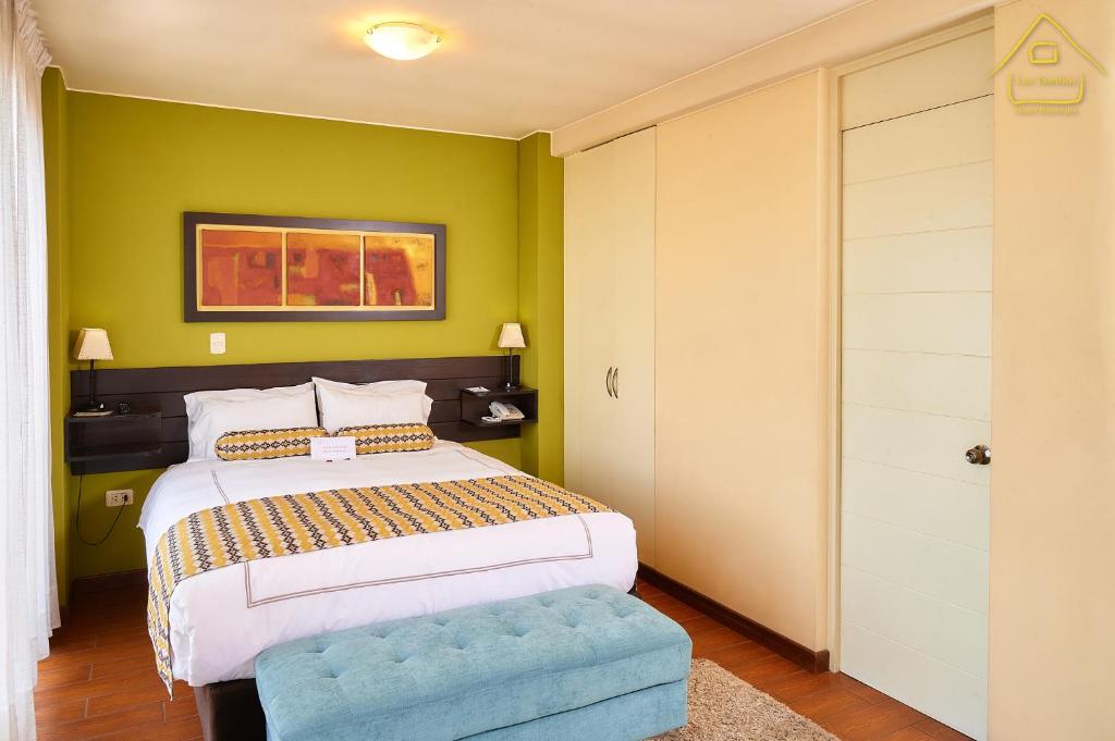 Postel nebo postele na pokoji v ubytování Hotel Los Tambos Boutique