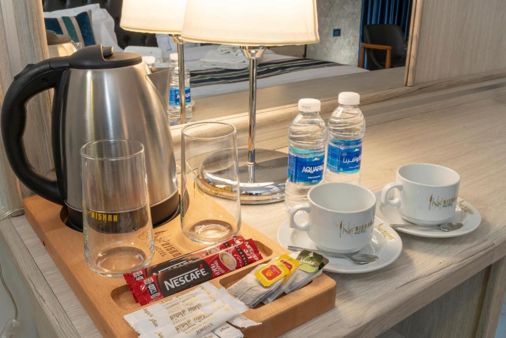 Príslušenstvo na prípravu kávy alebo čaju v ubytovaní Nishan Hotel