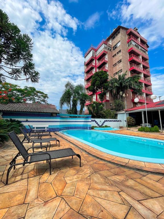 Bazén v ubytování Hotel das Rosas nebo v jeho okolí