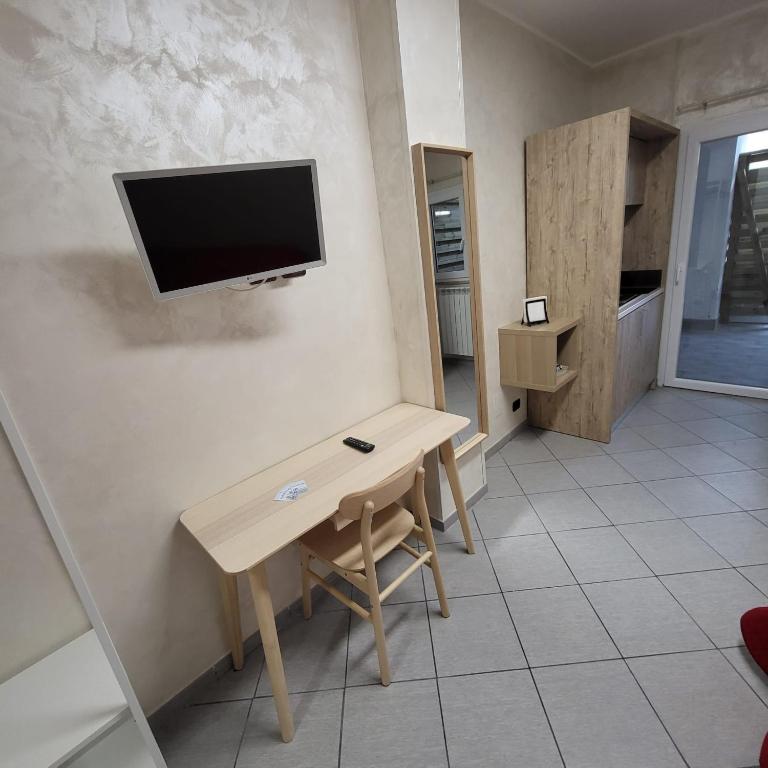 Telewizja i/lub zestaw kina domowego w obiekcie HomeFamily