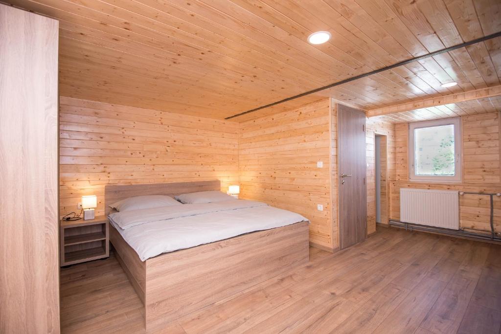 Postel nebo postele na pokoji v ubytování Zotlar House