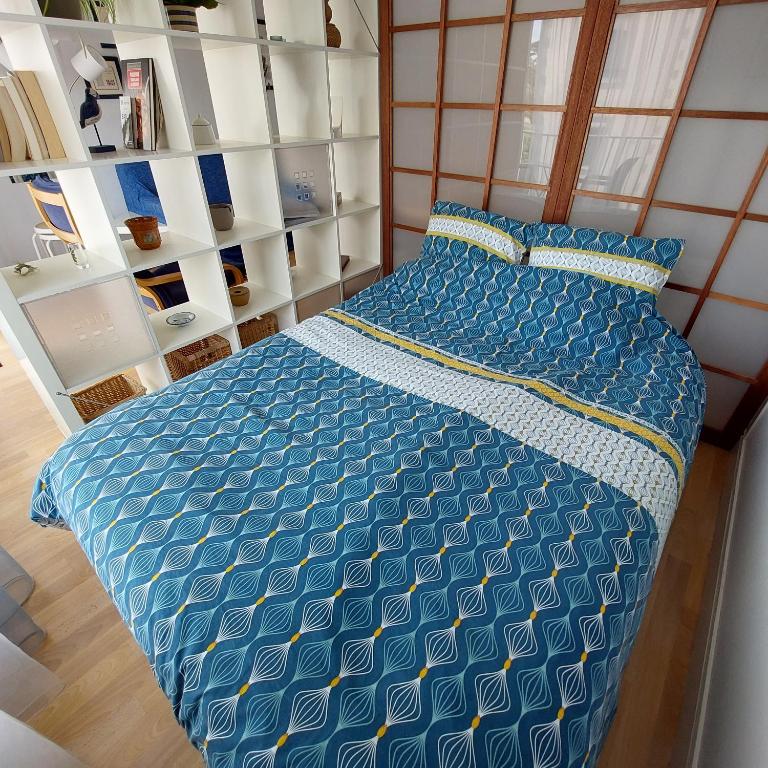 Postel nebo postele na pokoji v ubytování Studio lumineux proche port & plages