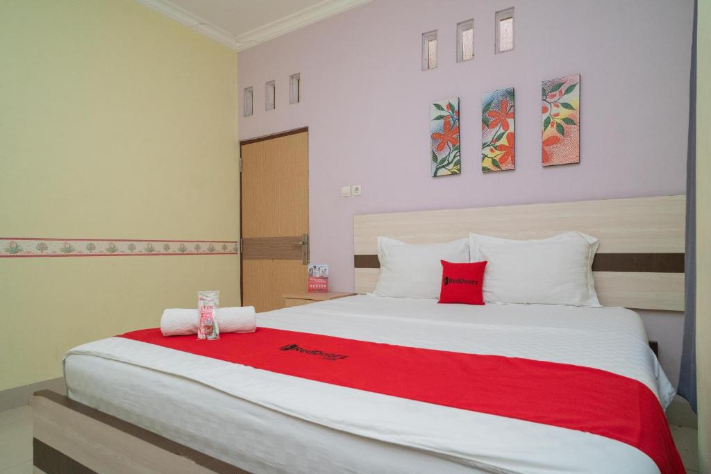 Легло или легла в стая в RedDoorz Syariah Near Lapangan Dwiwarna Barabai