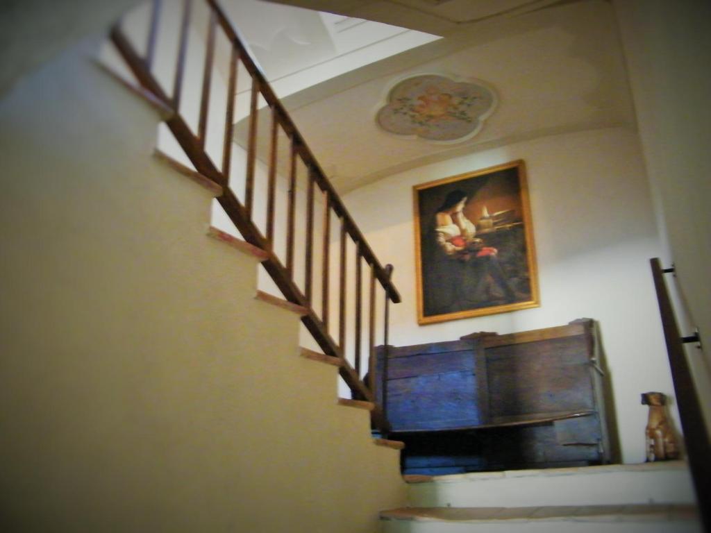 A television and/or entertainment centre at Room and Breakfast Torre