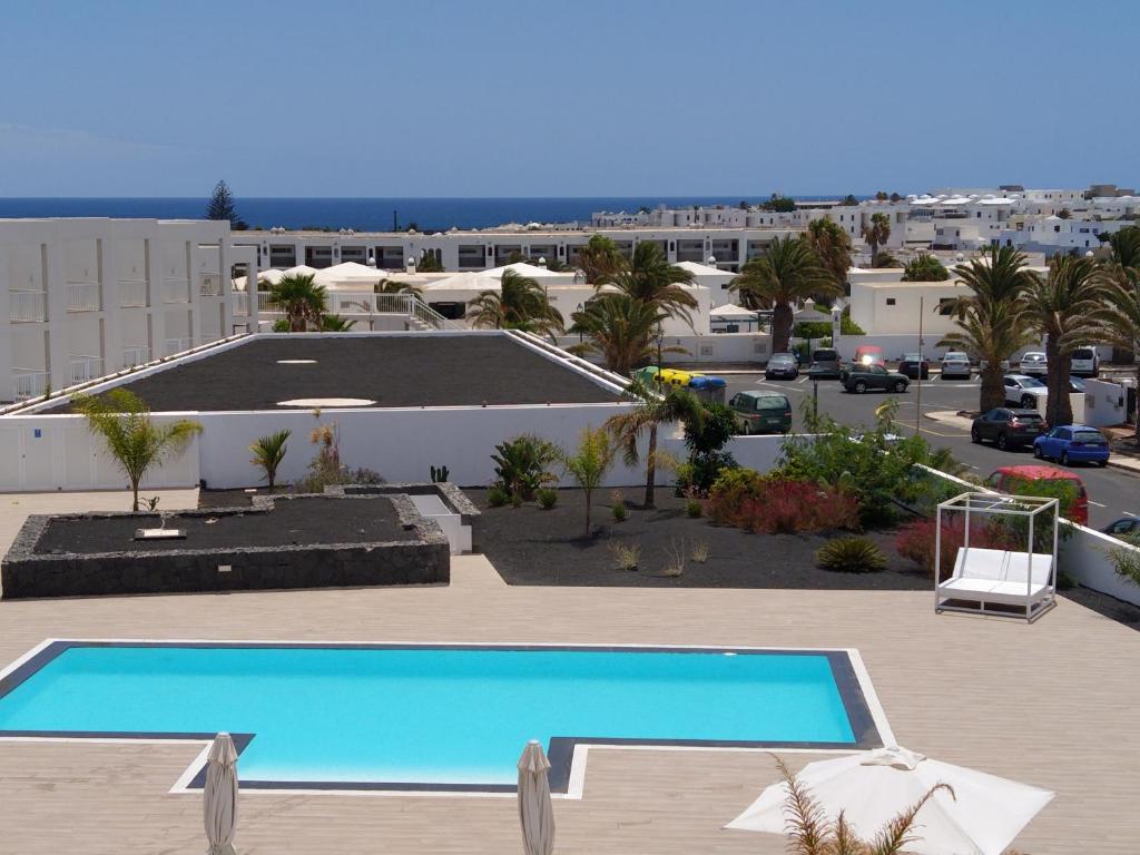 Bazén v ubytování Apartment Aqui Todo Empieza - Pool view - Free WiFi - smart TV-Residence Senator nebo v jeho okolí