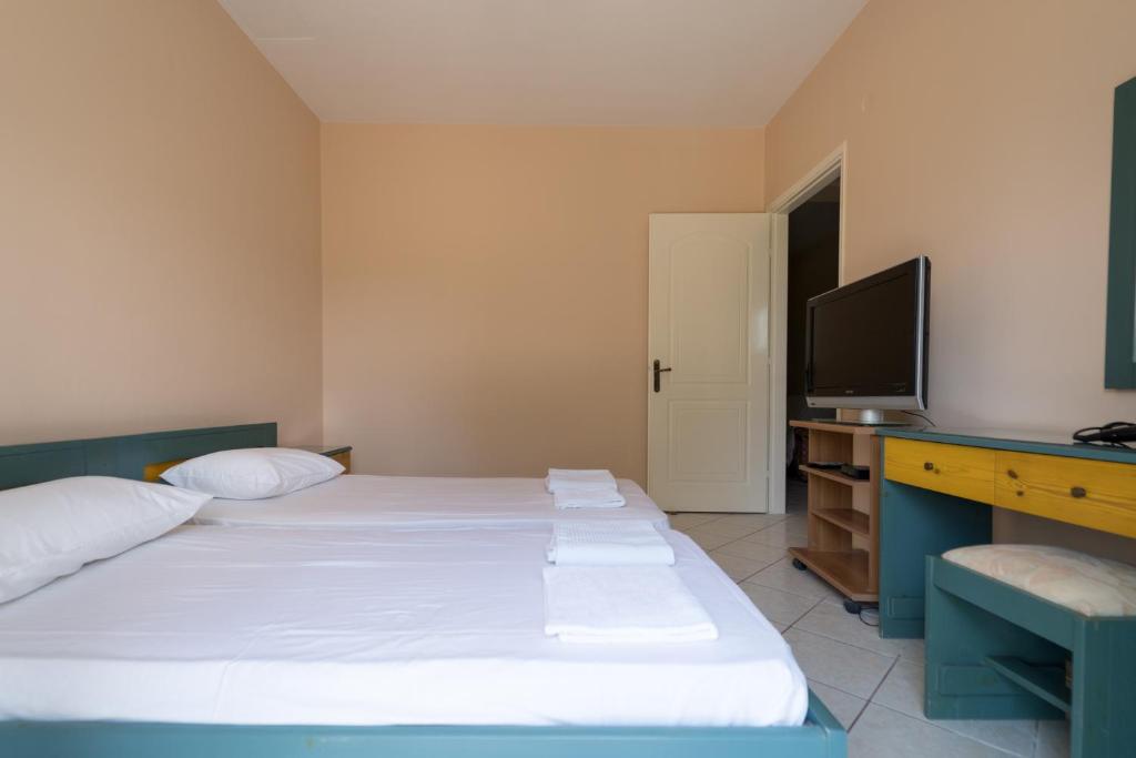 Postel nebo postele na pokoji v ubytování SPIROS HOME