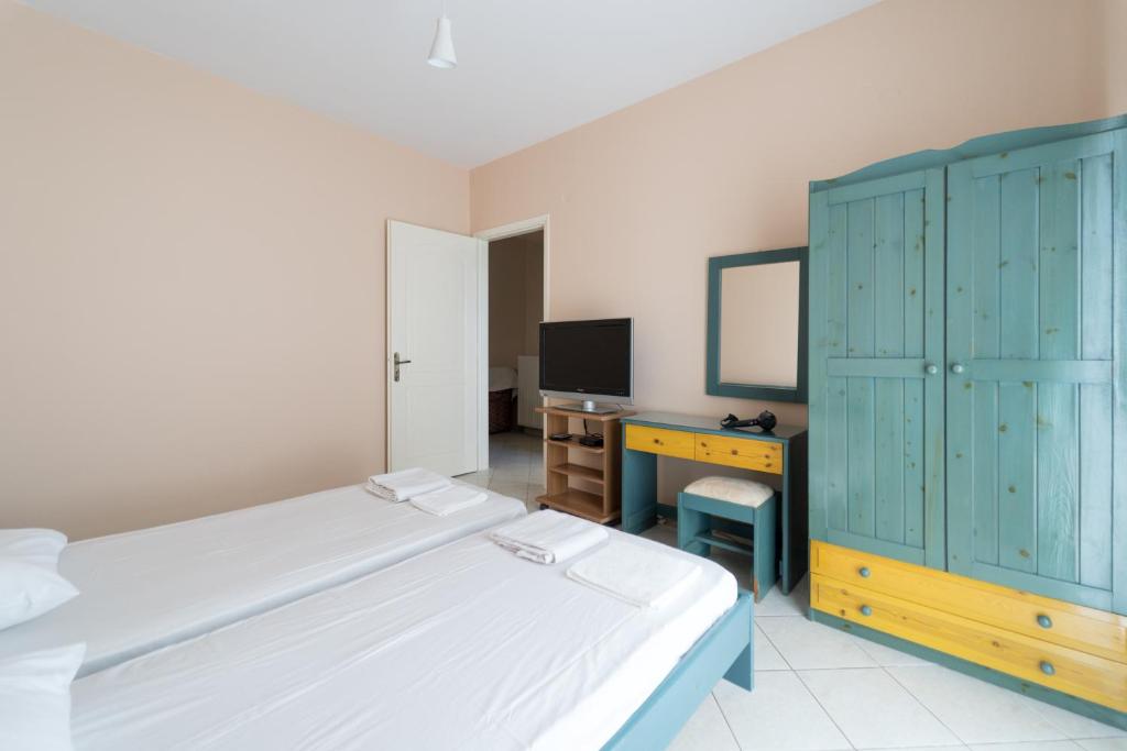 Postel nebo postele na pokoji v ubytování SPIROS HOME