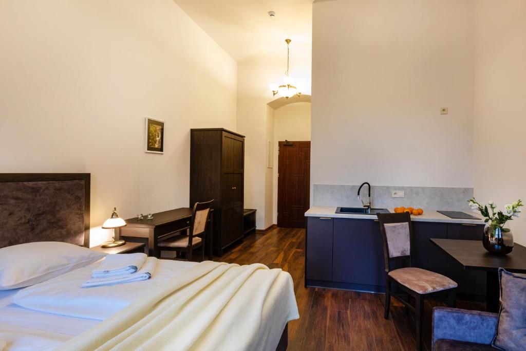 Postel nebo postele na pokoji v ubytování ZEPPELIN APARTMENTS Simple Acomodation