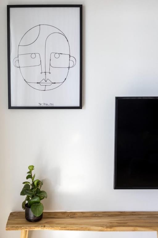 TV a/nebo společenská místnost v ubytování Gallerita