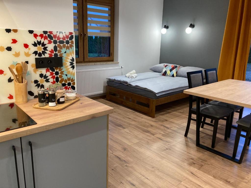 Łóżko lub łóżka w pokoju w obiekcie Rezydencja pod Cergową Wellness & SPA