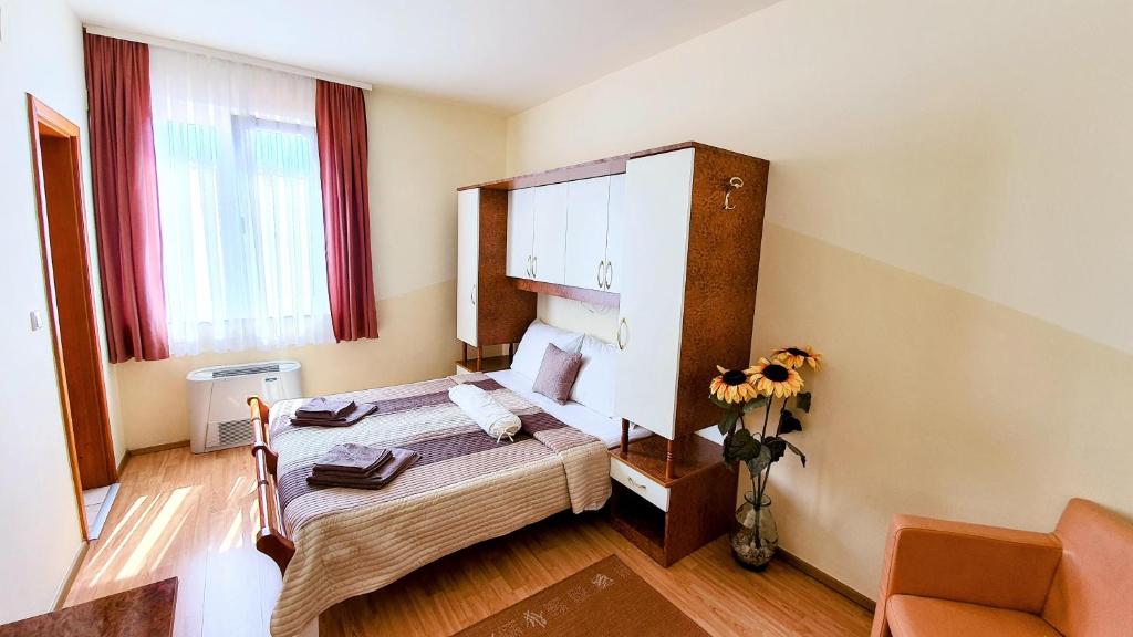 Postel nebo postele na pokoji v ubytování Villa Palčić