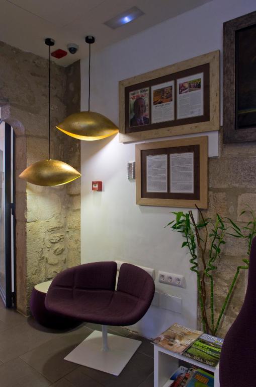 Posezení v ubytování Hotel Museu Llegendes de Girona