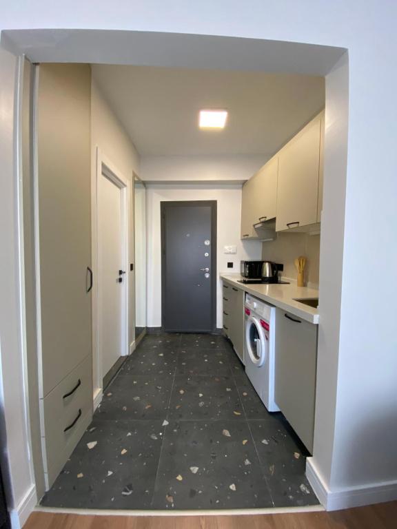 Kuchyň nebo kuchyňský kout v ubytování Galata VAV Suites