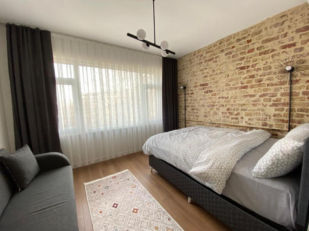 Postel nebo postele na pokoji v ubytování Galata VAV Suites