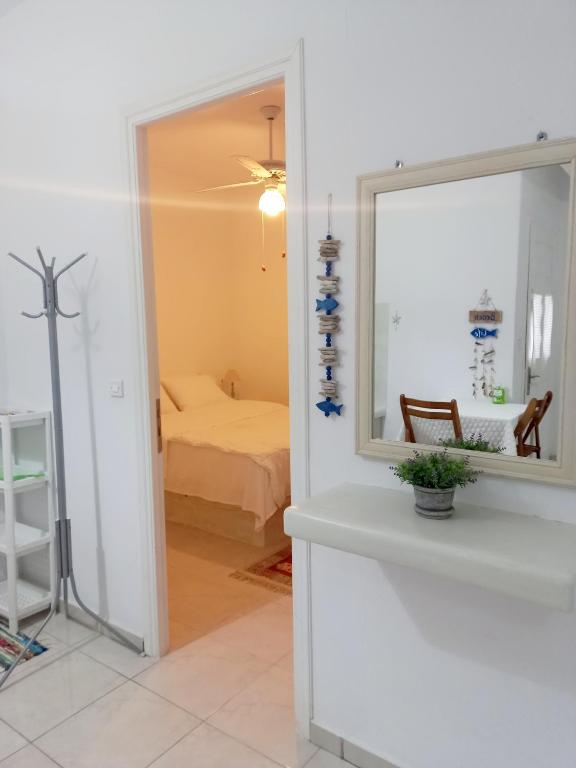Postel nebo postele na pokoji v ubytování Marianna Studios