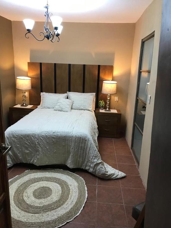 Postel nebo postele na pokoji v ubytování Casa de las Escaleras