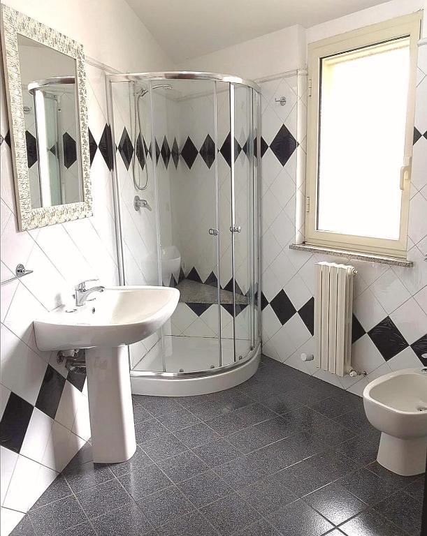 Il Girasole - Chambre Quadruple Avec Salle De Bains Commune