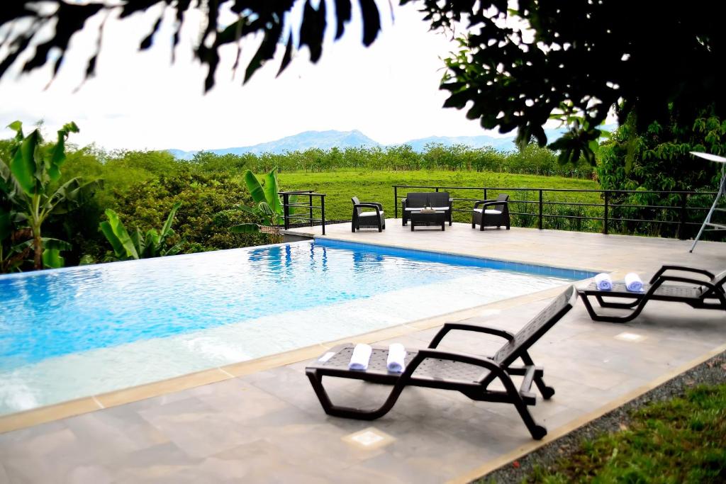 Piscina en o cerca de ORIGEN FINCA HOTEL