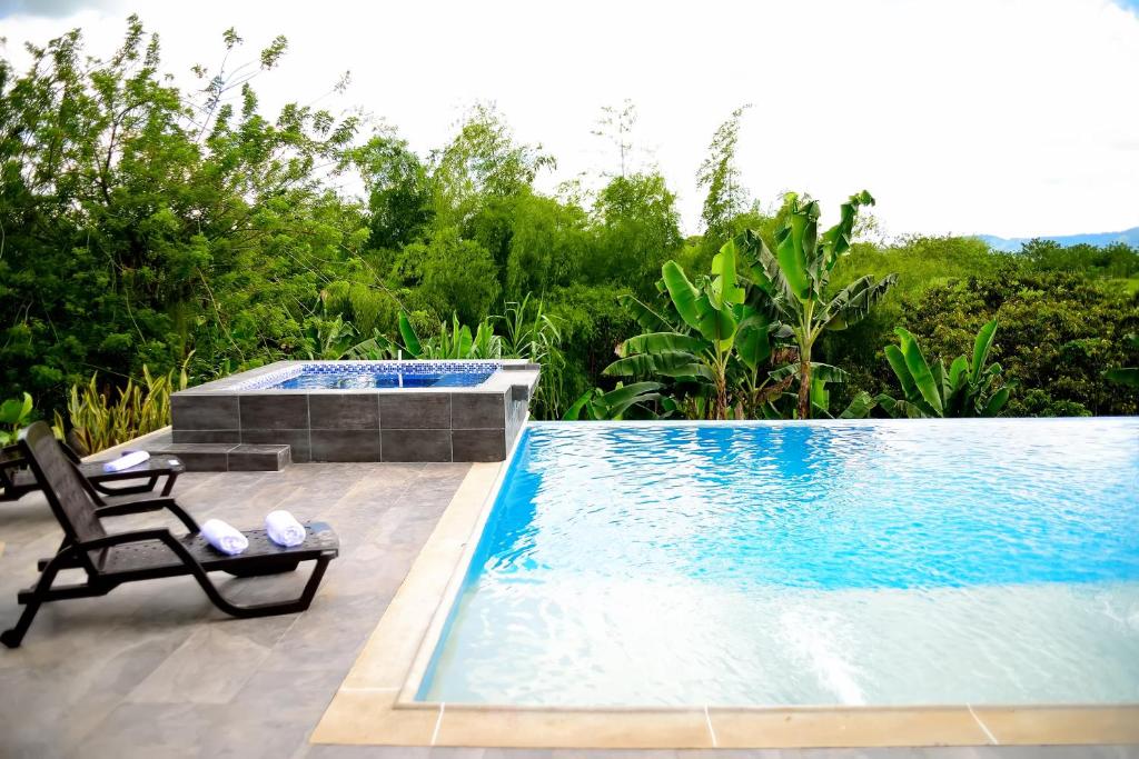 Piscina en o cerca de ORIGEN FINCA HOTEL