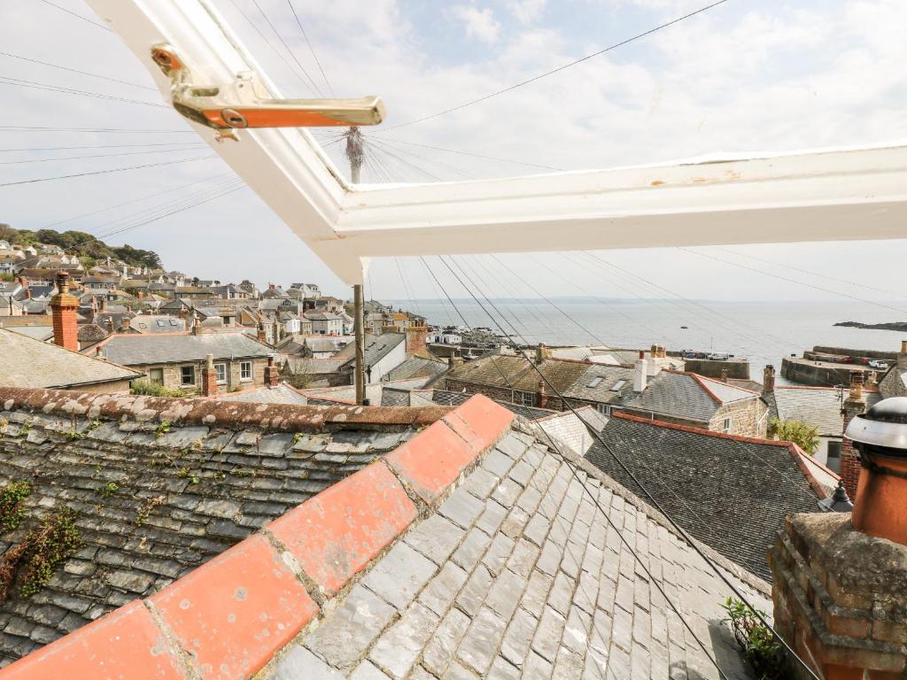 a view of a city from the roof of a house at Mole Cottage in Mousehole