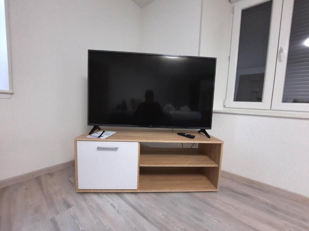TV a/nebo společenská místnost v ubytování VDT Vacances