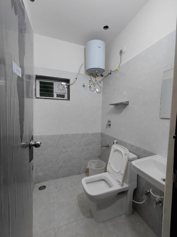 Koupelna v ubytování Minimal Poshtel