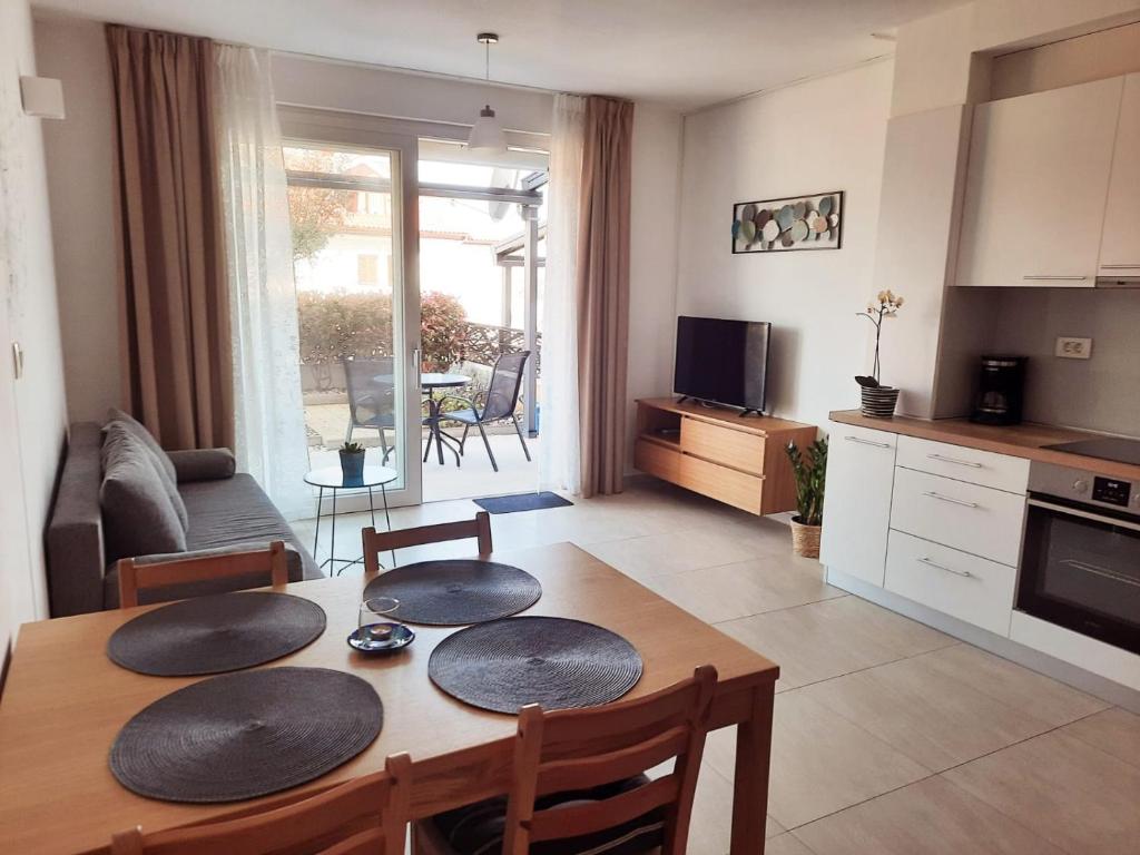 Kuchyň nebo kuchyňský kout v ubytování Apartman Madonnina