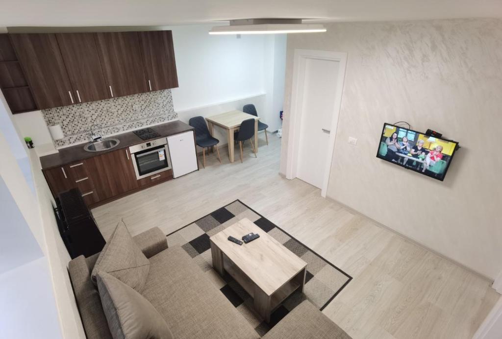 Kuchyň nebo kuchyňský kout v ubytování KRAGUJ apartman 2