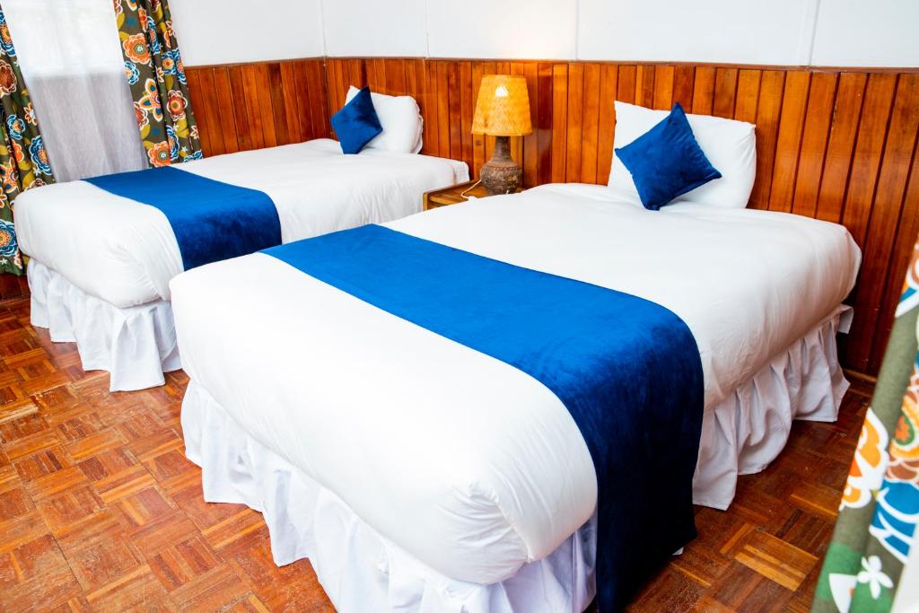 Voodi või voodid majutusasutuse Naro Moru River Lodge toas