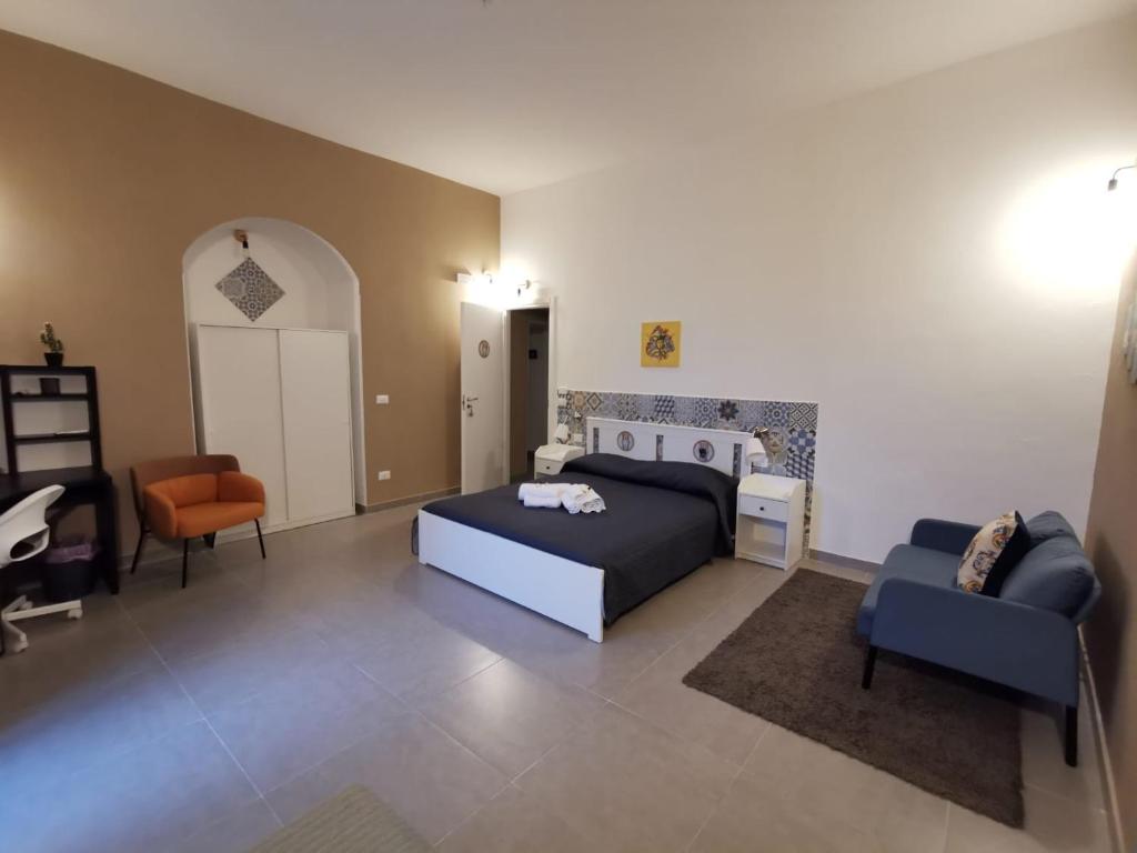 Postel nebo postele na pokoji v ubytování Hercules Suites