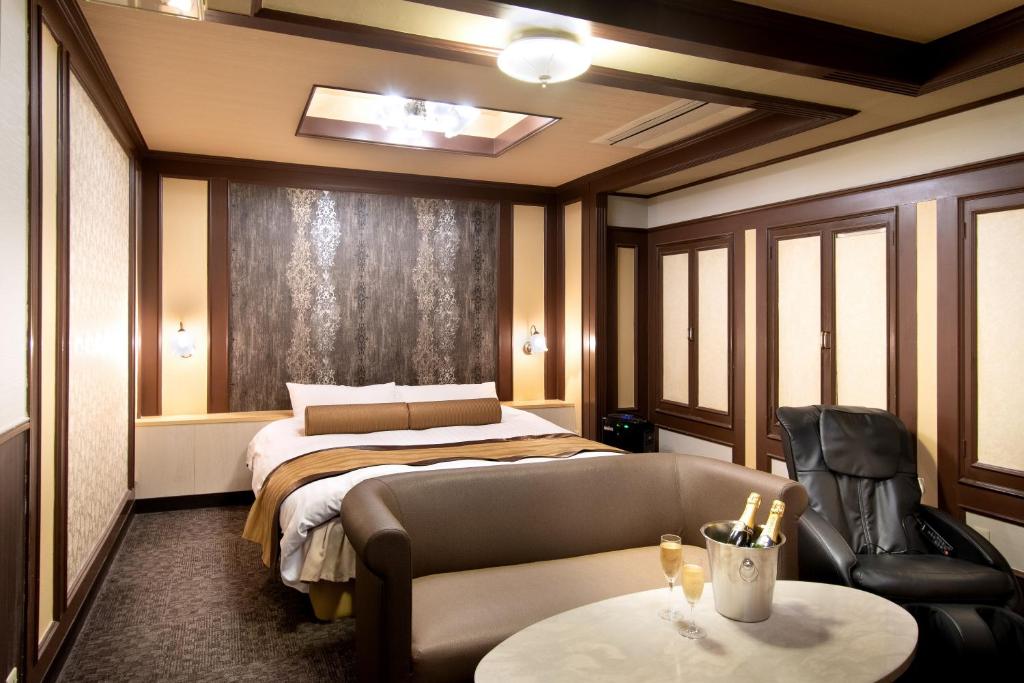 Postel nebo postele na pokoji v ubytování Hotel Benkyo Beya Amagasaki