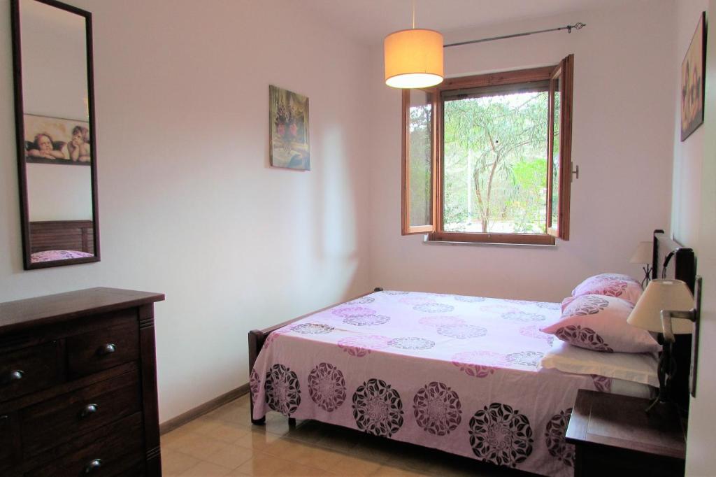 Posteľ alebo postele v izbe v ubytovaní Purple House - Arboriamar Platamona
