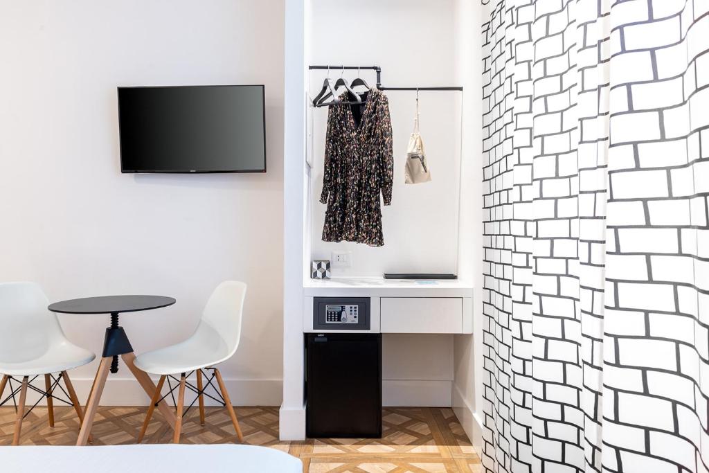 TV a/nebo společenská místnost v ubytování Sleep B&B