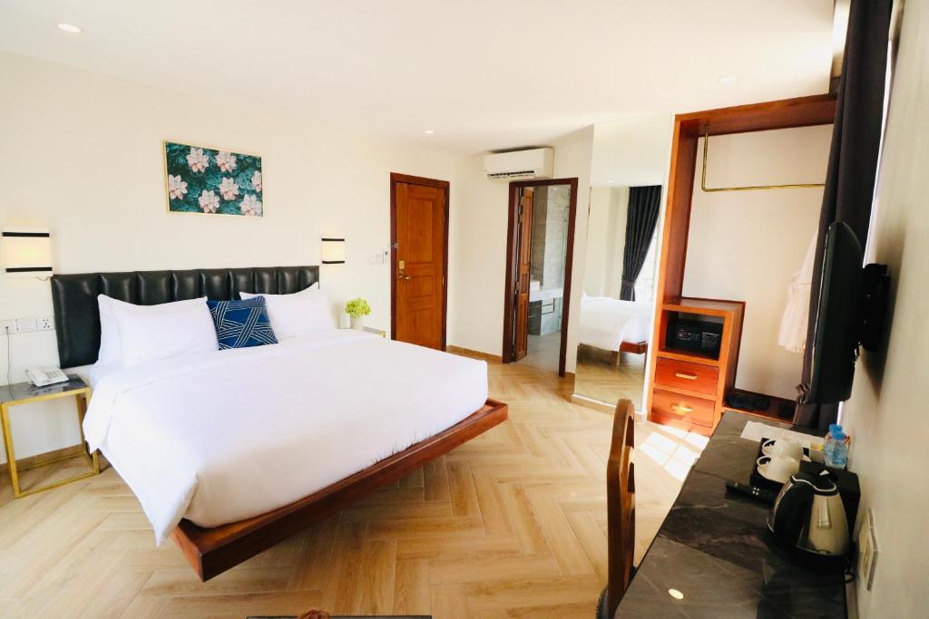 Un ou plusieurs lits dans un hébergement de l'établissement Mettavary Hotel