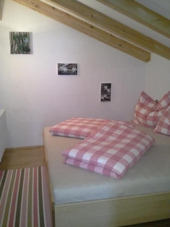 Postel nebo postele na pokoji v ubytování Onemooshof