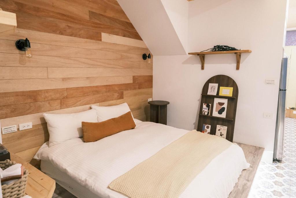 Postel nebo postele na pokoji v ubytování South Gate Home Stay