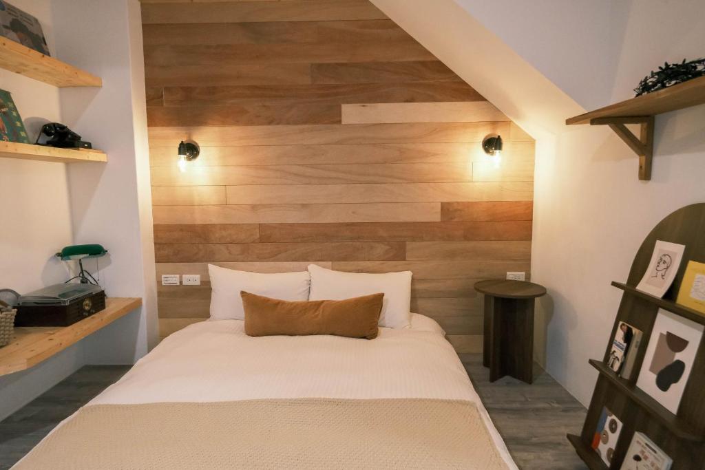 Postel nebo postele na pokoji v ubytování South Gate Home Stay