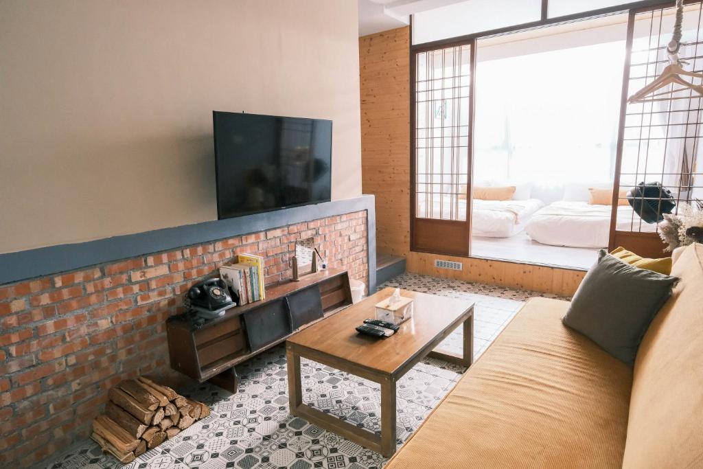 TV a/nebo společenská místnost v ubytování South Gate Home Stay