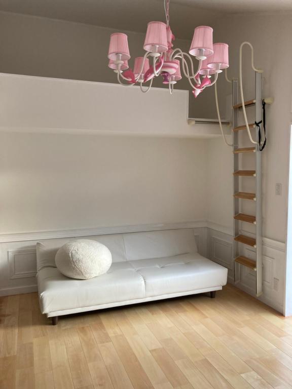Postel nebo postele na pokoji v ubytování SASAKOJIMA cottage