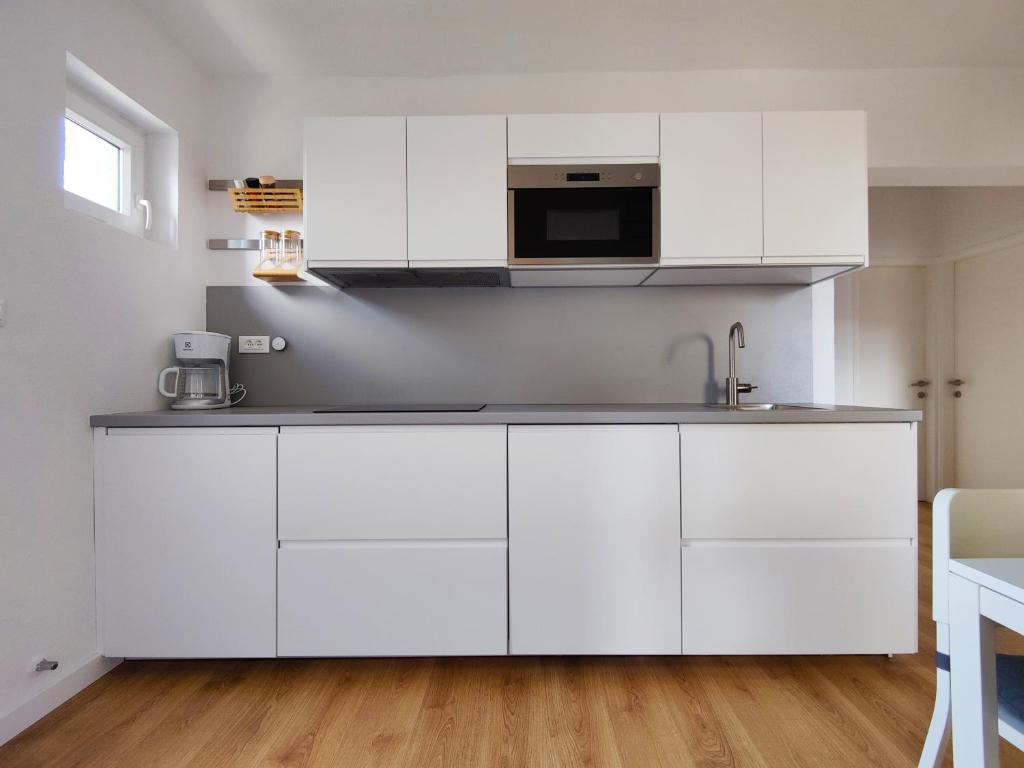 Kuchyň nebo kuchyňský kout v ubytování Apartment Lipa Rovinj