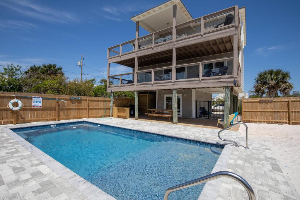 Completely updated, new private pool, awesome patio and only steps to beach!