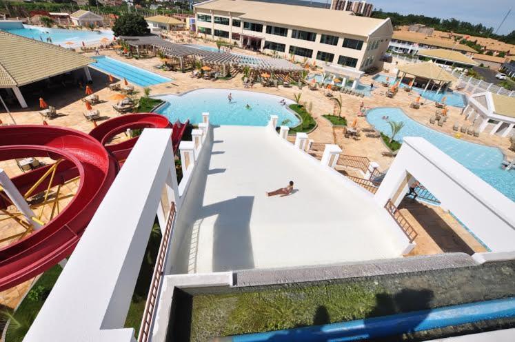 a view of a resort with two swimming pools at LACQUA DI ROMA HOTEL in Caldas Novas