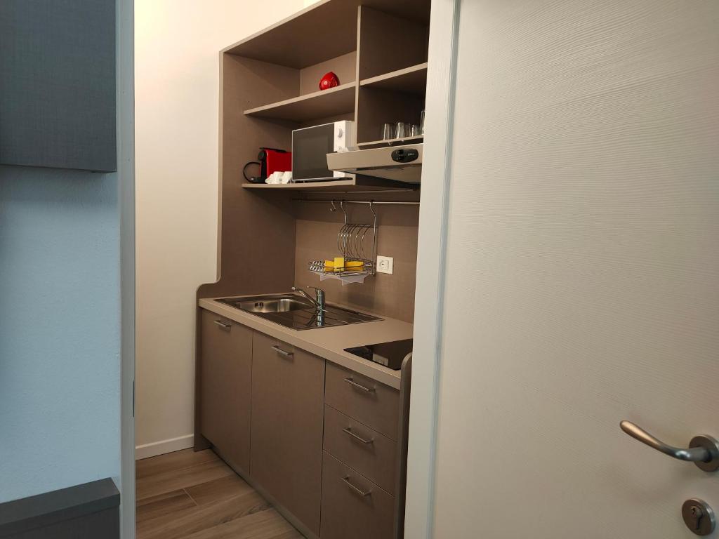 A kitchen or kitchenette at IRIS AR holiday-home