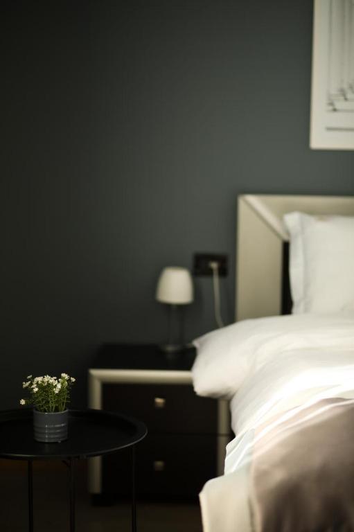 Postel nebo postele na pokoji v ubytování Triss Hotel