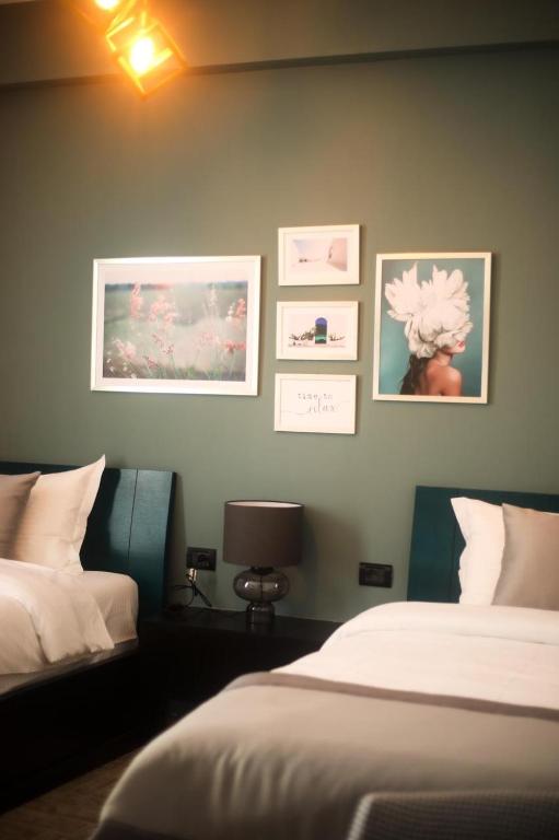 Postel nebo postele na pokoji v ubytování Triss Hotel
