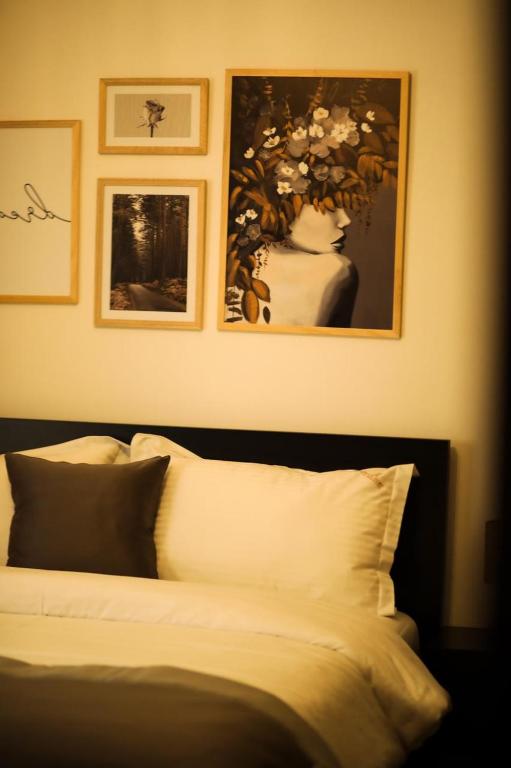 Postel nebo postele na pokoji v ubytování Triss Hotel